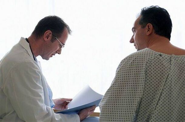 Doctor prescribing medicine for prostatitis to patient